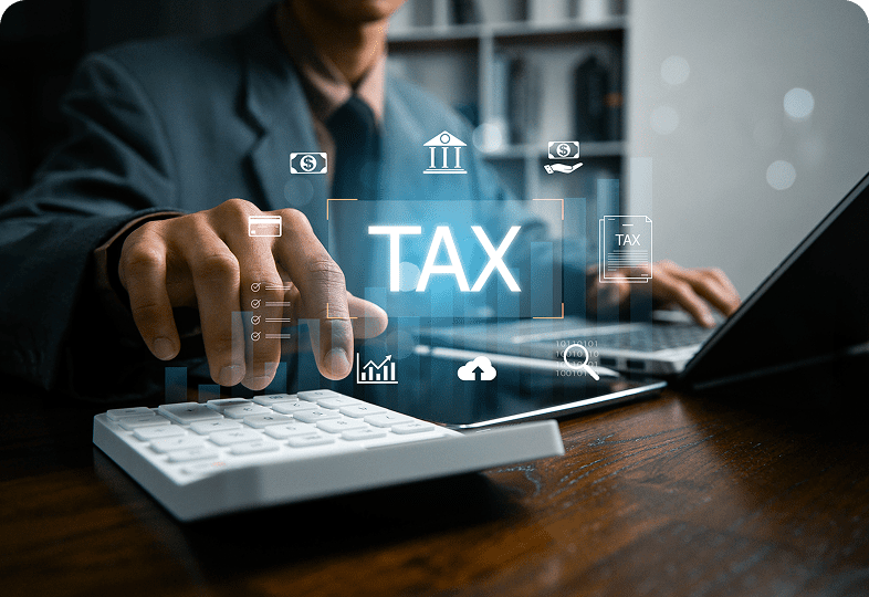 Tax calculation using laptop and calculator